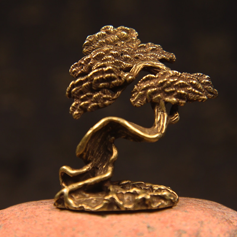 

Латунные статуэтки сосен