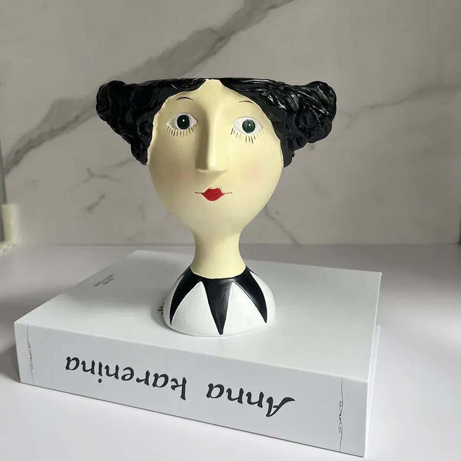 

Портретные цветочные горшки из смолы