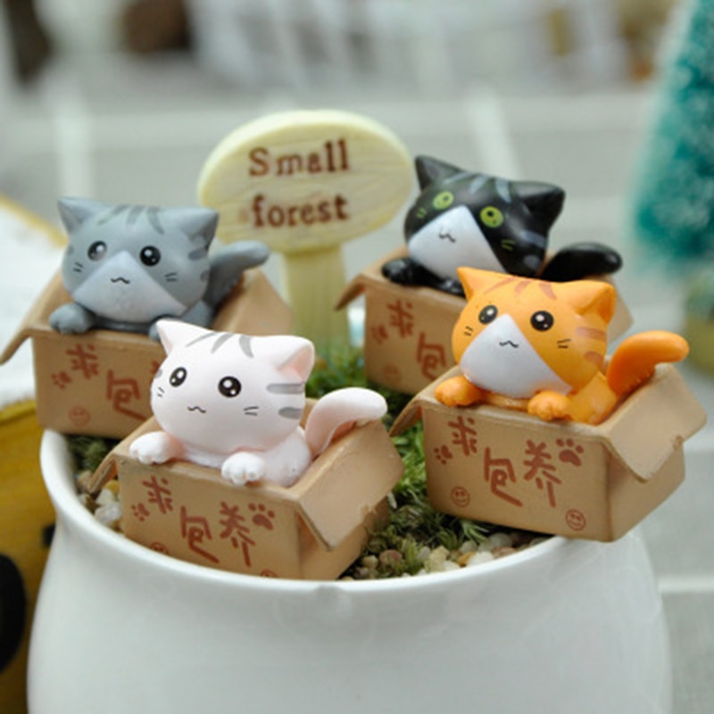 

Миниатюрные фигурки кошки из канифоли