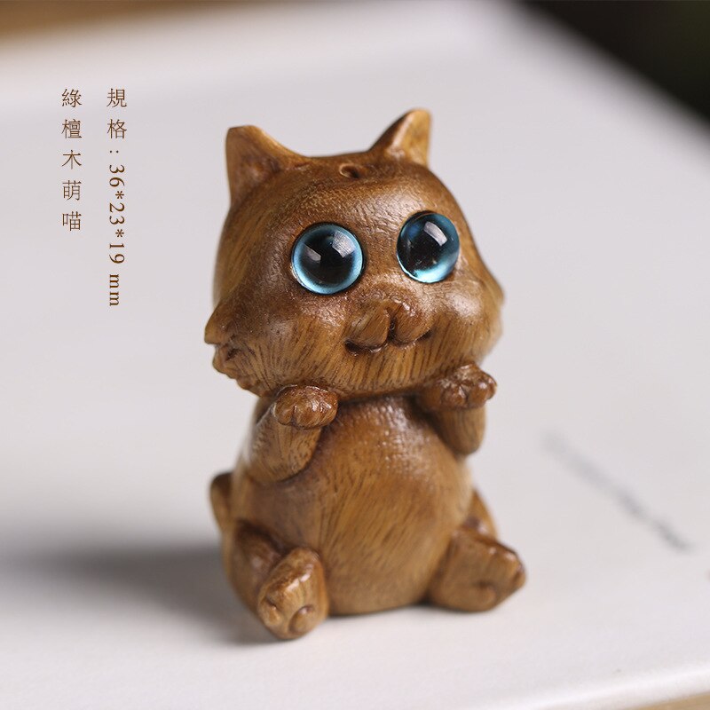 

Деревянные фигурки кошек