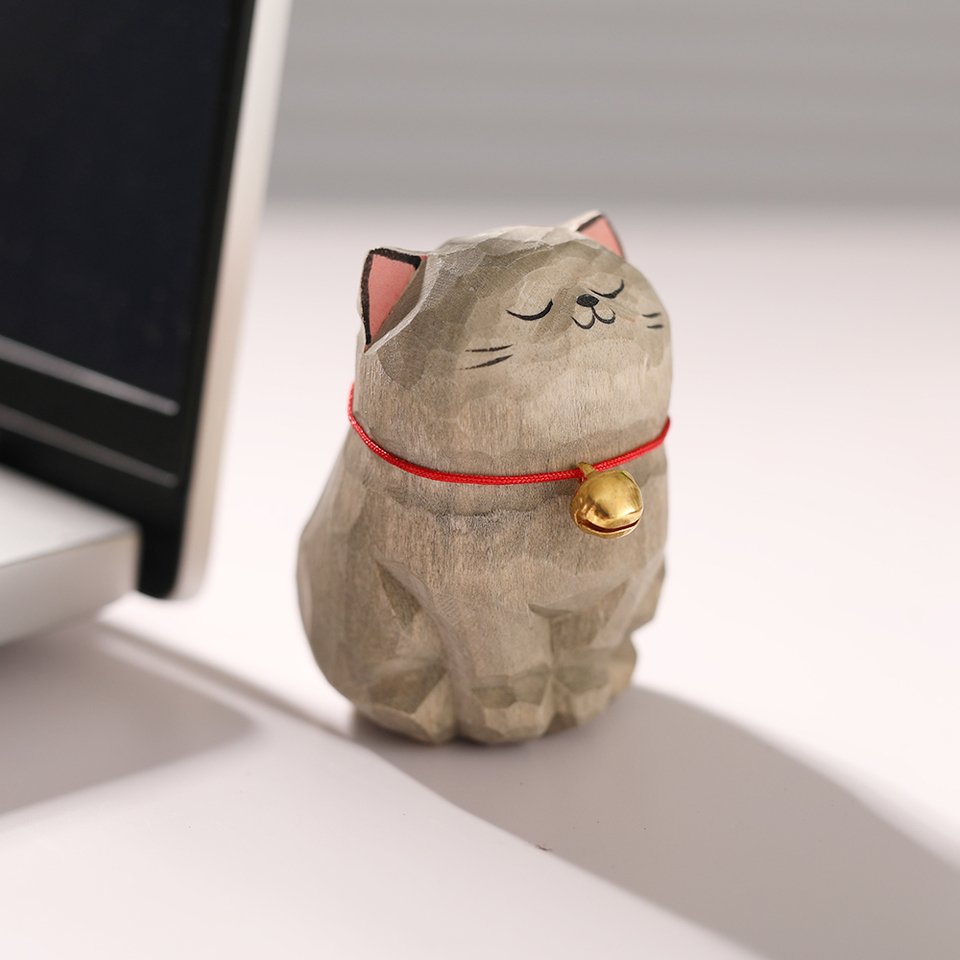 

Резная деревянная статуэтка кошки