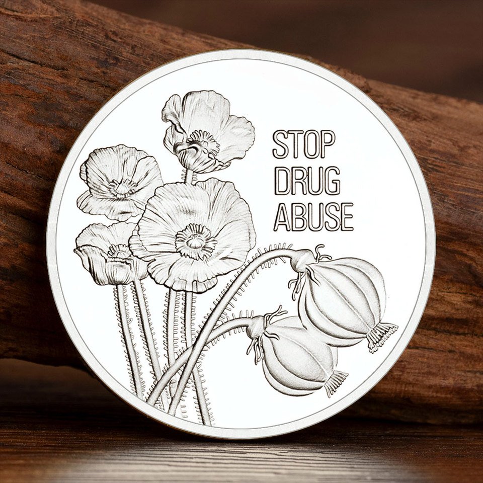 

Посеребренная монета United Nations Stop Drug Abuse