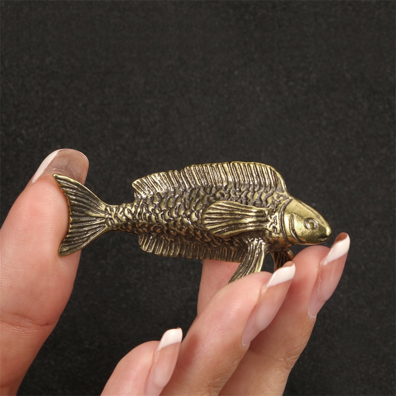 

Миниатюрная статуэтка из латуни Arowana