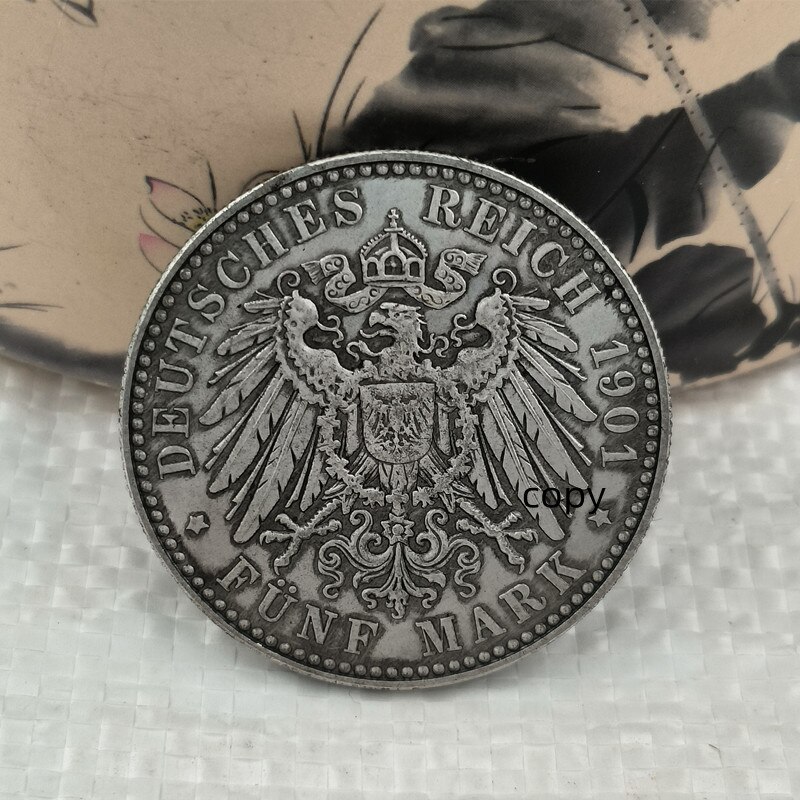 

Немецкие серебряные монеты 1901 года XMSJ