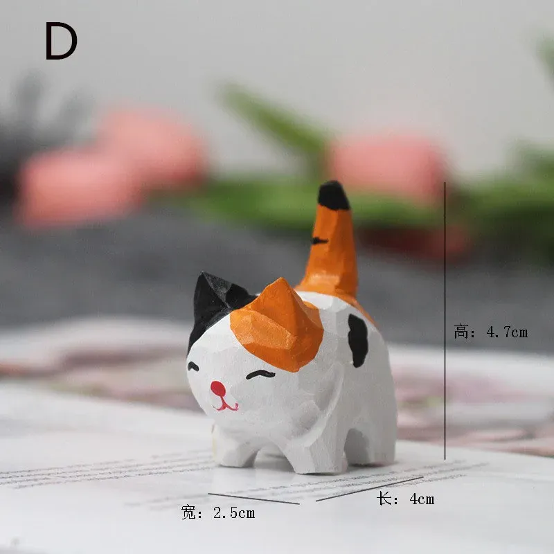 

Деревянные фигурки кошек